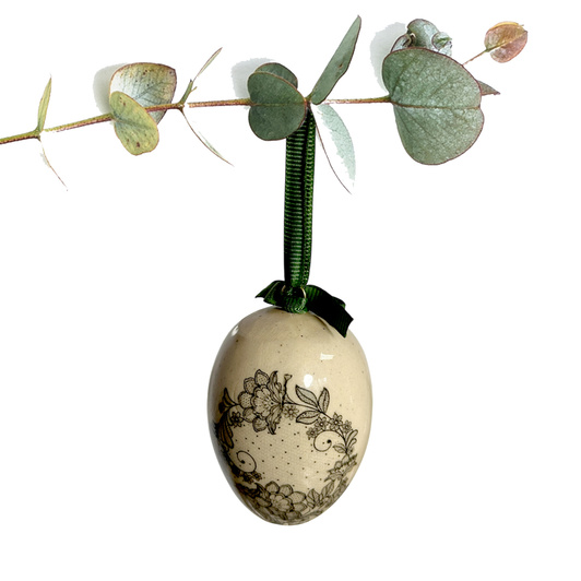 Jajko wielkanocne z zieloną wstążeczką. Koroneczki delikatne, asymetryczne