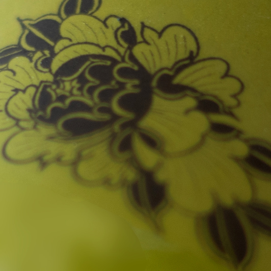 Filiżanka na kawę z tatuażami, zielona