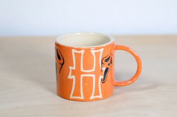 Kubek na kawę lub herbatę. Pomarańczowo-Biały w upiorne duchy