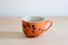 Filiżanka na kawę z tatuażami, pomarańczowa